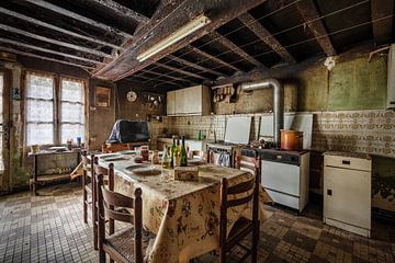 Kitchen in dilapidated house by Inge van den Brande