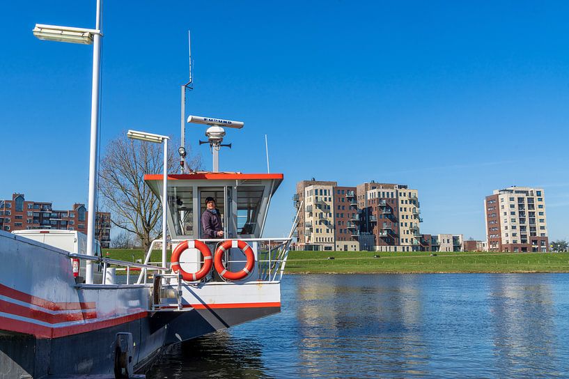 The ferry at Cuijk across the river Maas by Jeroen Hoogakker