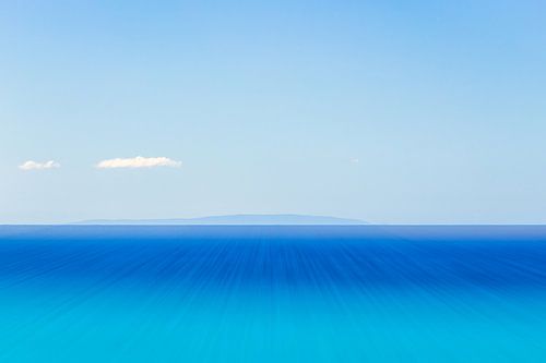 Gavdos with clouds in blue