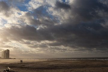 Two silhouettes in the autumn light on the beach at Ostend