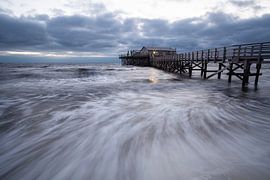 The stormy North Sea near the stilt houses of St. Peter-Ording by Jiri Viehmann