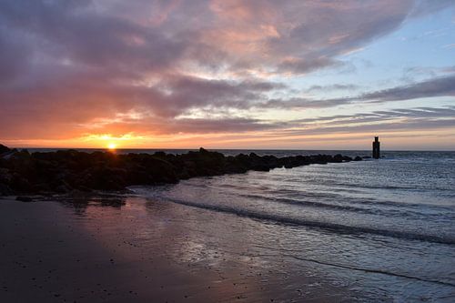 North Sea beach Ouddorp during sunset