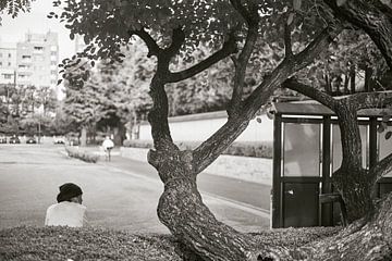 Man in park, Tokyo, Japan. by André Bouterse