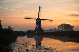 Zonopkomst boven de Giessen bij Slingenland van Eibert den Hengst