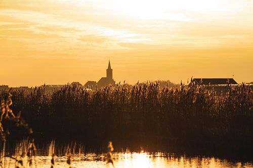 Zonsondergang bij het water