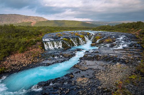 The stunning Bruarfoss blue waterfall in Iceland