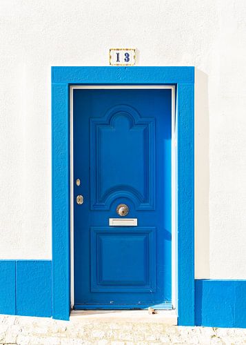Blue and white door in Ericeira, Portugal