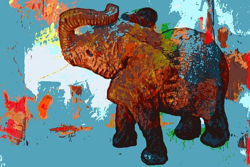 A hand-carved wooden elephant, mixed media