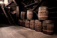 Barrels of paint pigment in old mill 
