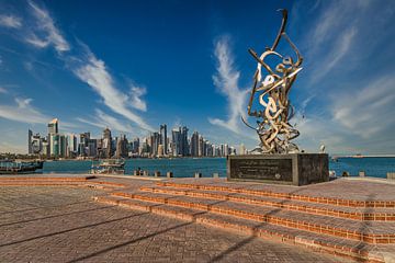 Doha Qatar skyline daylight view with clouds in the sky by Mohamed Abdelrazek