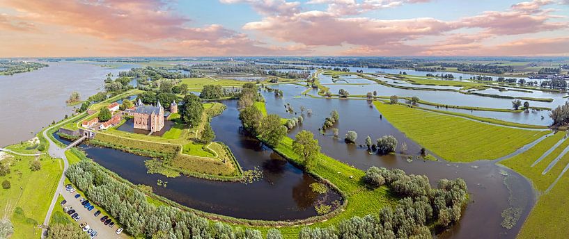 Aerial panorama of Loevestein Castle in a flooded landscape on the Merwede river in the Netherlands at sunset by Eye on You