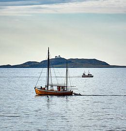 Maritime traffic while the Erkna lighthouse keeps watch, Norway by qtx
