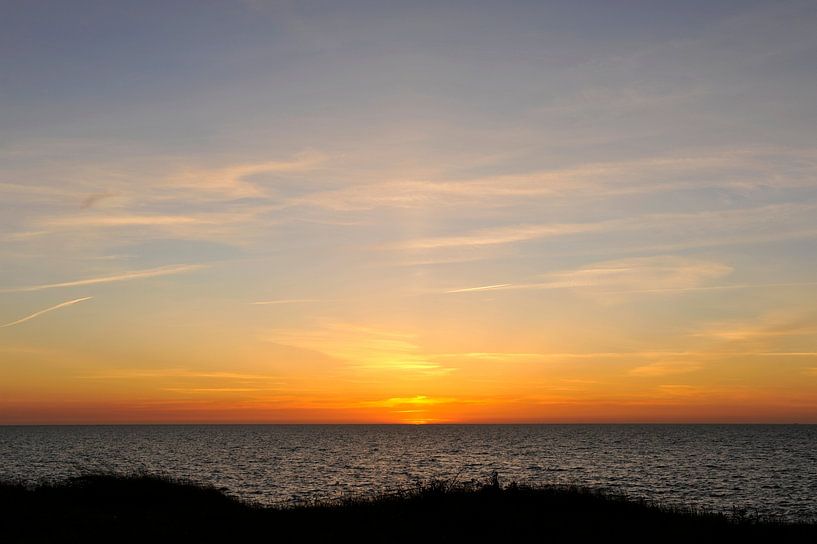 Coucher de soleil sur la côte zélandaise par Edith Wijte
