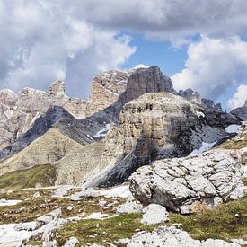 Majestic rock formations tower impressively into the sky: the Three Peaks present themselves in perfect light, surrounded by rugged peaks, alpine paths and barren high mountain landscape. by Miriam Schwarzfischer