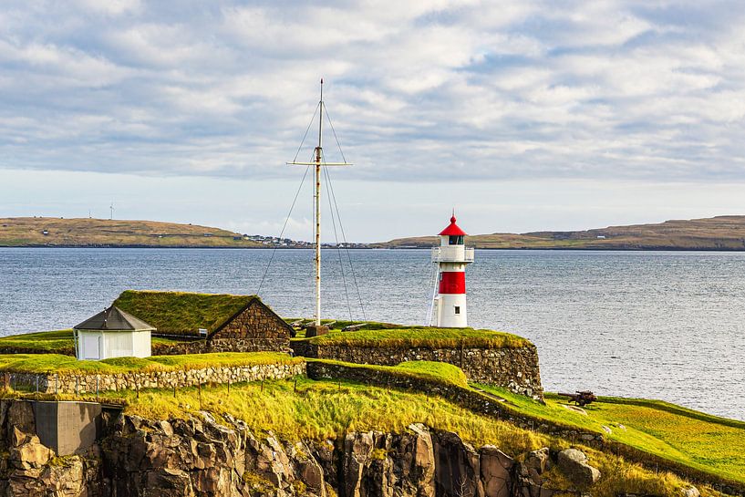 Lighthouse in the town of Tórshavn on the Faroe Islands by Rico Ködder