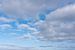 Wolken boven Noordzee van Jan Pott