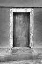 Houten deur betonnen muur van Jan Brons thumbnail