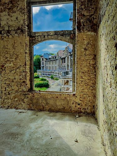 The curved building looks so impressive through a window.