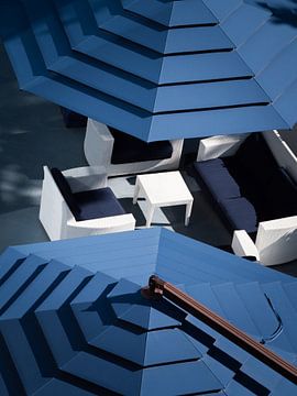 Sunshades with seating and table by Mustafa Kurnaz