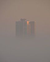 Torenflat boven mist