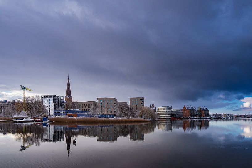 View over the Warnow to the Hanseatic city of Rostock in winter by Rico Ködder