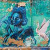 Street art Colombia | Portrait woman in blue by Ellis Peeters