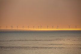 Windmolens bij zonsondergang sur Fred Icke