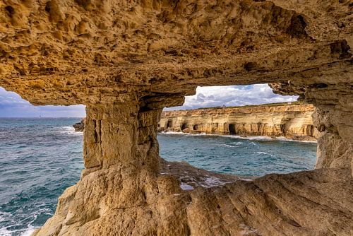 Cave with a view of the rocky coast