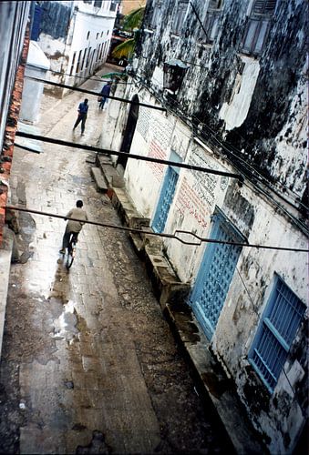 Straßenszene nach dem Regen Stonetown, Sansibar (Mji Mkongwe), Tansania