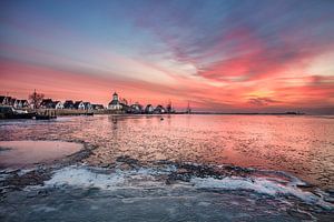 The village of Durgerdam along IJmeer lake at sunrise in winter