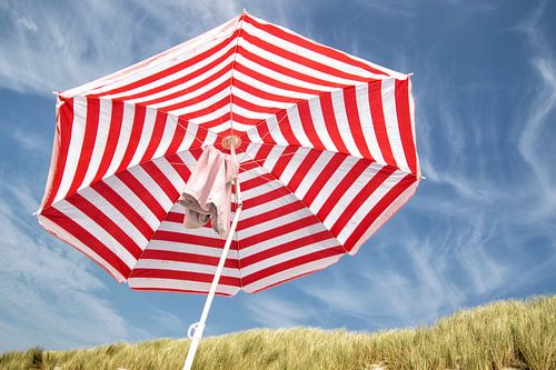 Red and white striped parasol
