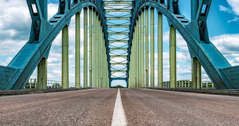 Old IJsselbridge over the river IJssel between Zwolle and Hattem. View from the middle of the road o by Sjoerd van der Wal Photography