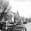 Amsterdam, Oude Schans met de Montelbaanstoren en de Sluyswacht. van Amsterdam Highlights