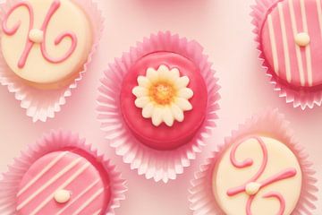 Five Pink and white colored Petit Fours van LHJB Photography