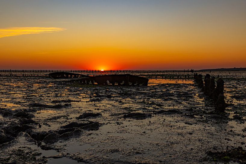 Wadden Sea, sunrise at Paesens Moddergat (Shipwreck of Wierum) by Gert Hilbink