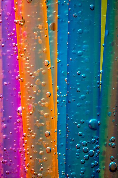 colourful straws with water pearls by Jürgen Wiesler