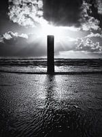 Beach pole in the surf