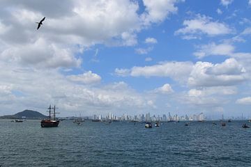 View of the harbour and the city in the distance by Claude Laprise