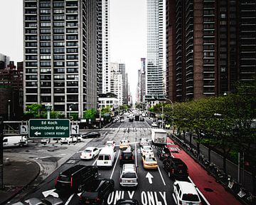 Vie de rue de la première avenue sur Dennis Donders