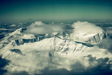 Norway during winter aerial view with snow covered mountains by Sjoerd van der Wal Photography