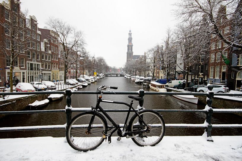 Snowy Amsterdam with the Westerkerk by Eye on You