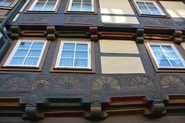 Facade of a historic half-timbered house in the old town of Wernigerode by Heiko Kueverling