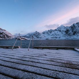 Scaffolding in the snow on a Norwegian fjord by Nadia Feys