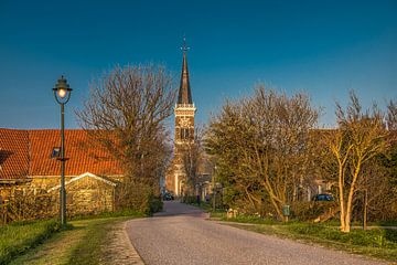 The Frisian village Cornwerd in the last evening light of spring by Harrie Muis