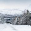 Besneeuwde weg in Noorwegen van KC Photography