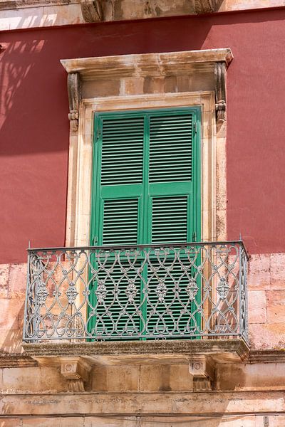 Balcony and door of old house by Jolanda van Eek en Ron de Jong