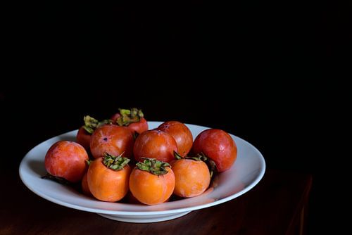 Kaki dans une assiette