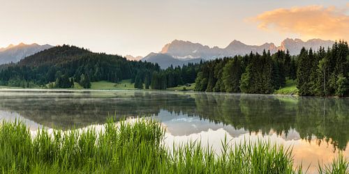 Karwendel Mountains reflected in the Geroldsee at sunrise, Bavaria, Germany