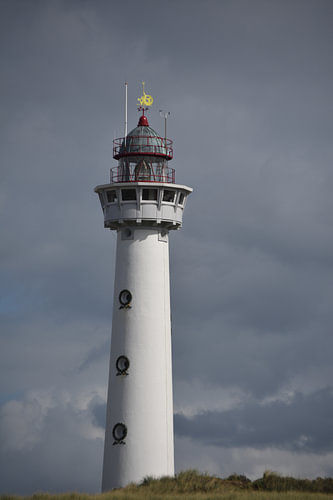 Lighthouse against a threatening sky.