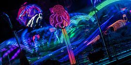 Light Cycle – A carousel set to the electric rhythm of the night by Mixed media vector arts